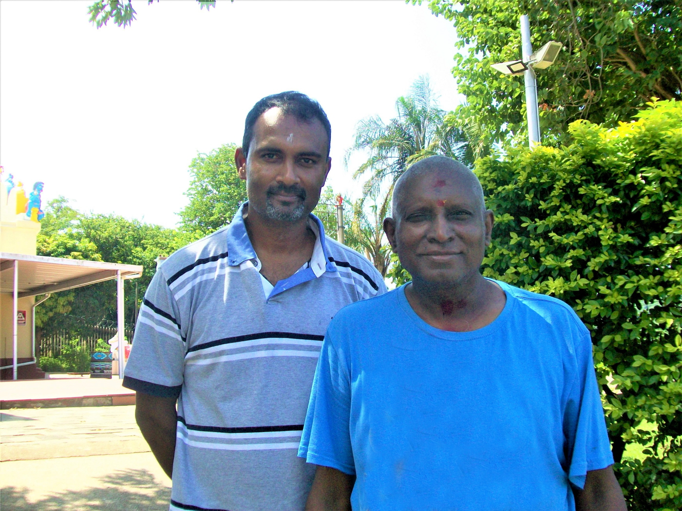 Guruji Dhanasagren Govender - Spiritual Leader of Umbilo Shree Amvalavaanar Alayam (Right) & Theshin Naicker the Embrace Founders Kind Guide (Left)
