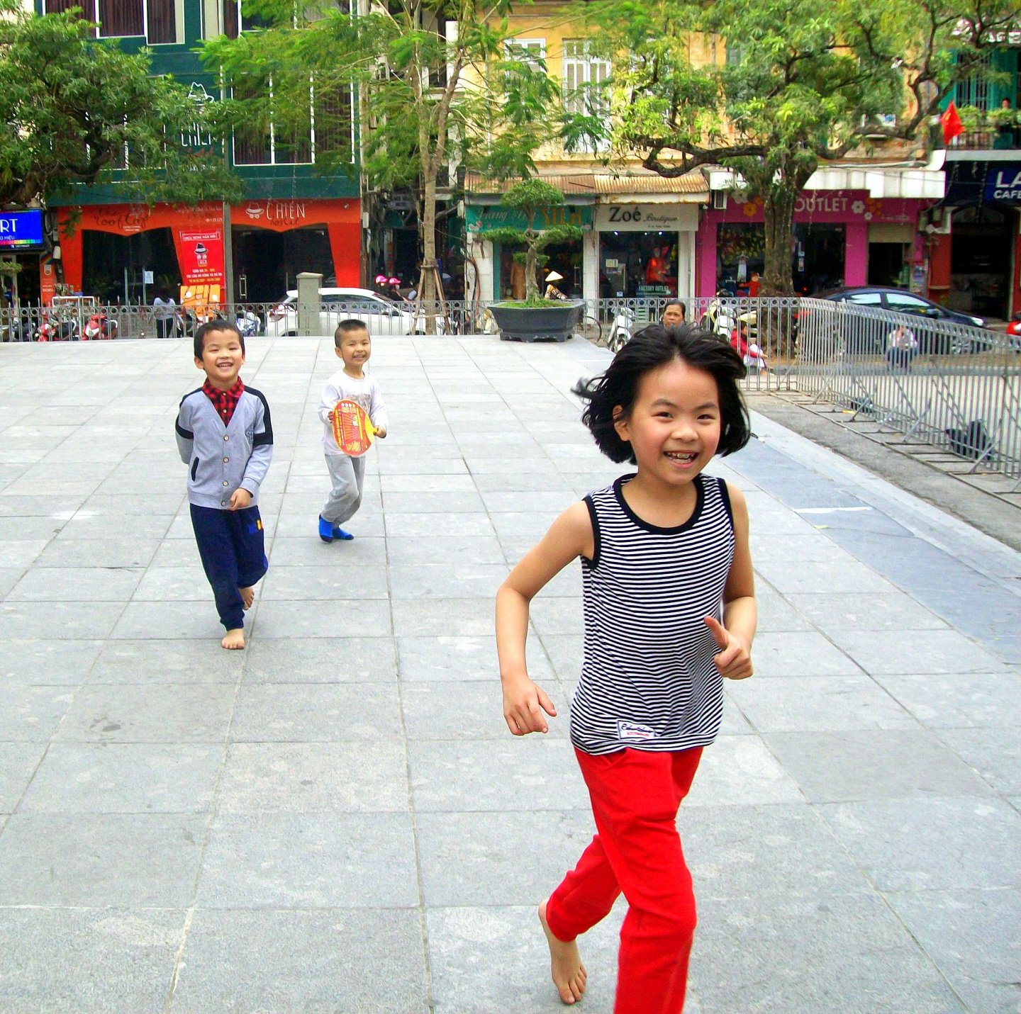Children Playing on Cathedral Front Steps in Hanoi, VIet Nam